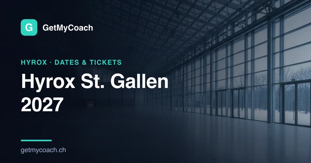 A large empty modern exhibition hall on a grey winter morning, a broad pale floor under a high steel-and-glass roof with tall glazed doors looking out onto snow and bare trees — cover image for the GetMyCoach guide to Hyrox St. Gallen 2027.
