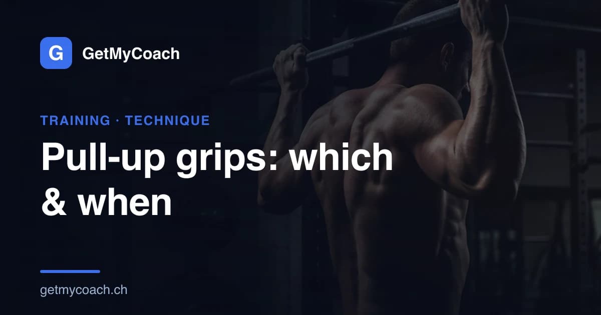 An athlete mid pull-up on a bar in an overhand grip.