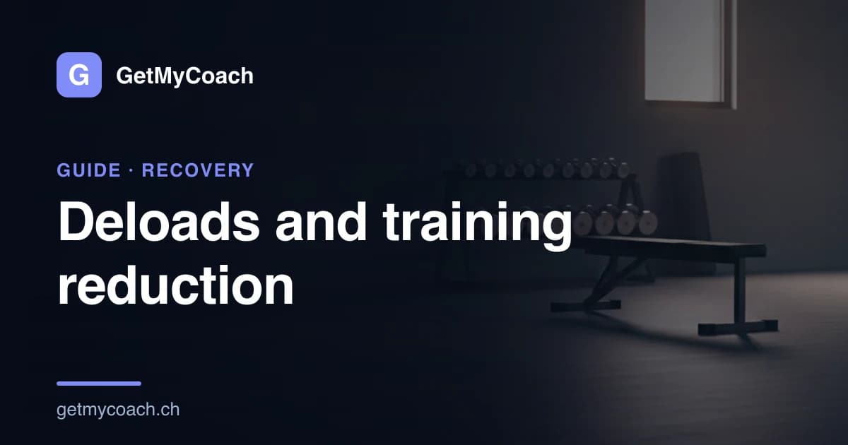 A quiet gym at the end of the day: an empty bench, a rack of light dumbbells against the far wall and a large expanse of bare floor in low evening light.