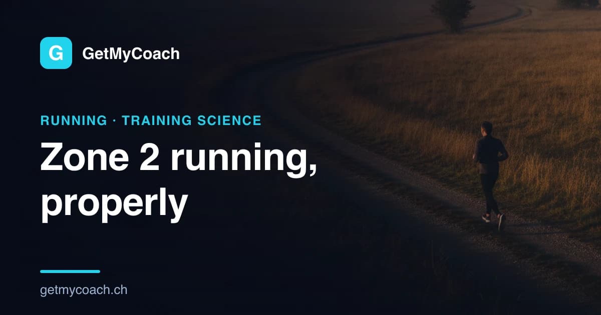 A lone runner on an empty path through open countryside in soft early light, moving at a relaxed, controlled pace — cover image for the GetMyCoach guide to zone 2 running.